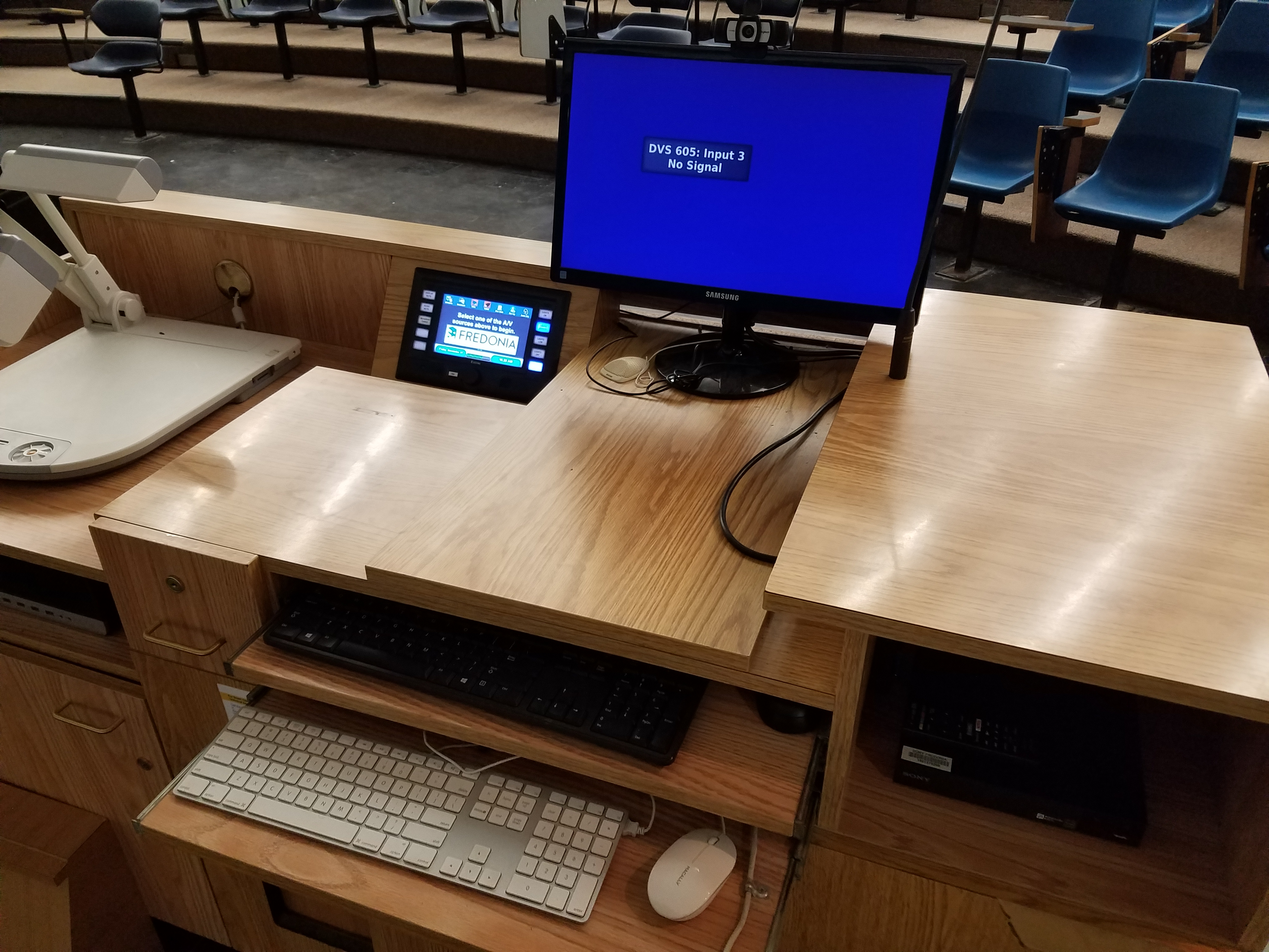Teachers station set up with a computer monitor and keyboard.