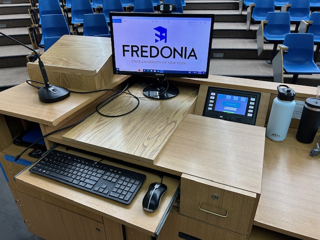 Accessible teachers station with a computer and Extron Touch Panel Controls