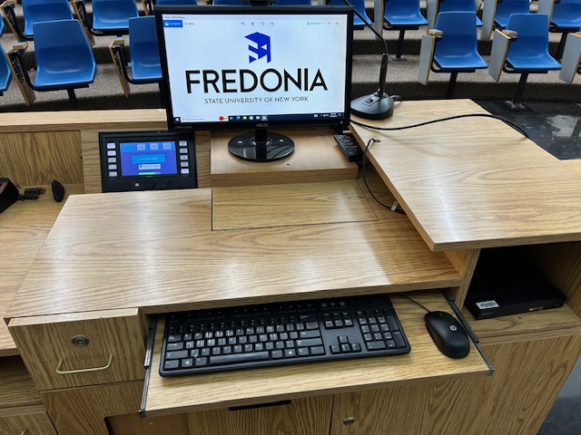 Accessible teachers computer station with an Extron touchpanel switcher.