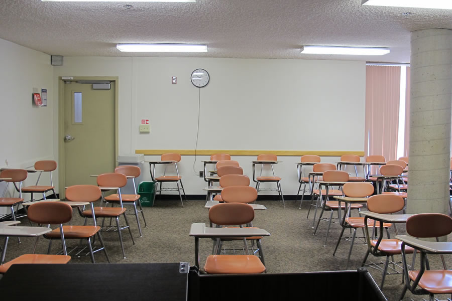McEwen 201 Smart Classroom student desks are arranged in rows.
