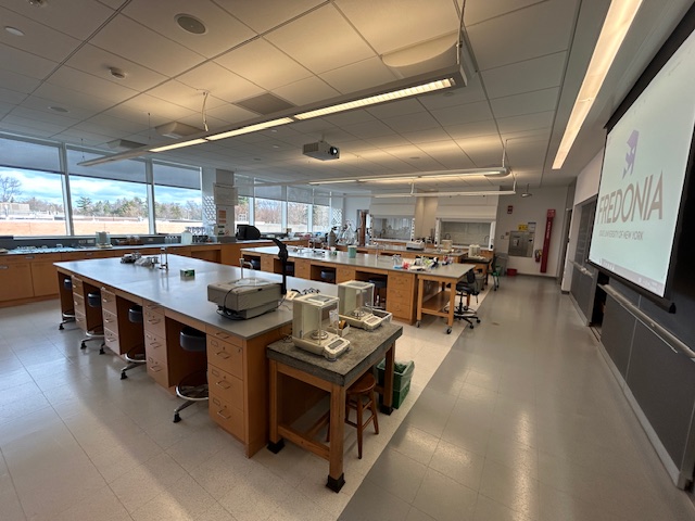 Back of the lab with student lab stations and equipment
