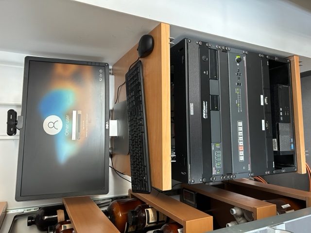 Computer station with an Extron switcher rack