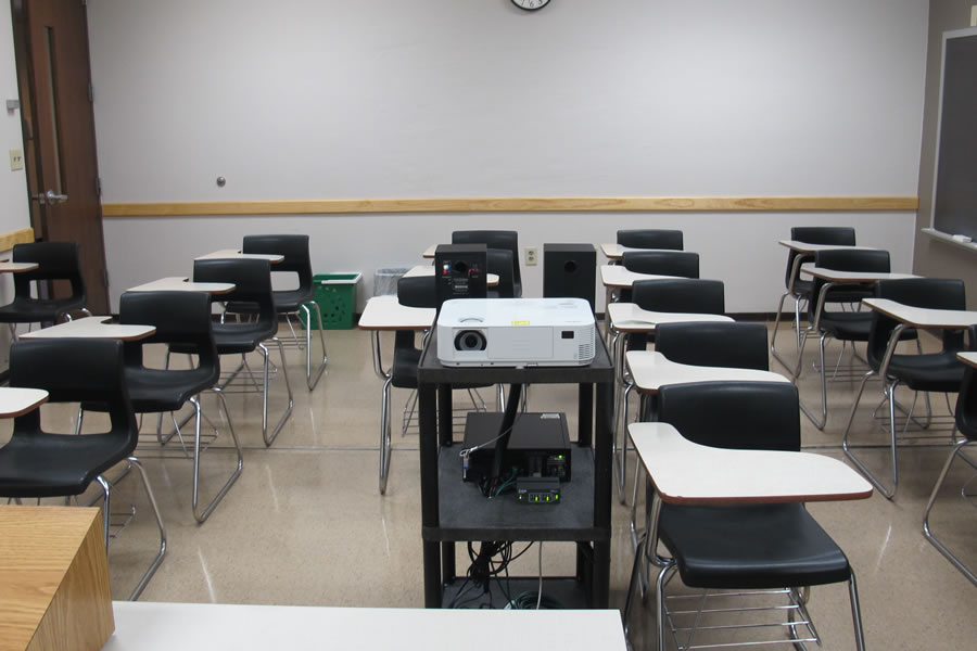 Student desks arranged in rows.