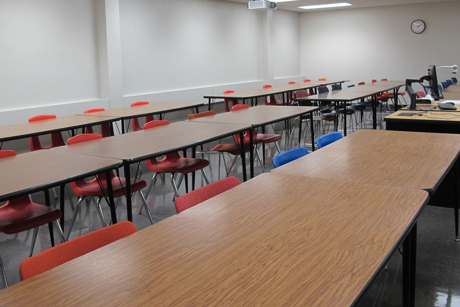 Student desks arranged in rows.