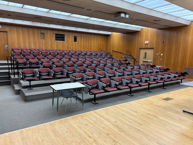 Back of the classroom with student classroom seats.