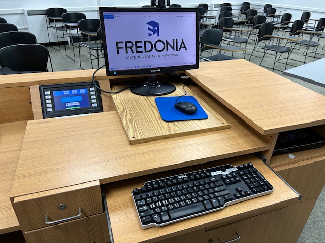 Accessible teachers computer station set up with an Extron Touch Panel Switcher