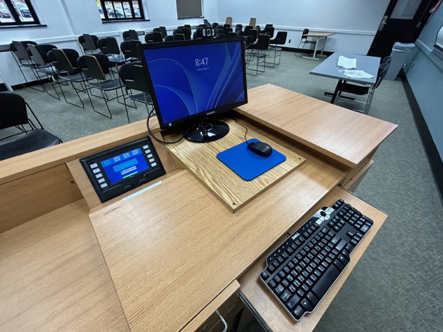 Teachers computer station with an Extron touch panel