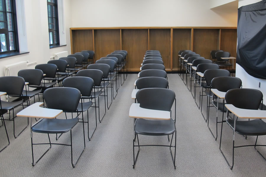 Fenton 1756 Students desks are arranged in rows.