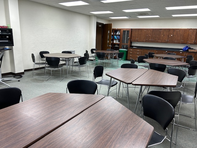 Back of the classroom with student desks.