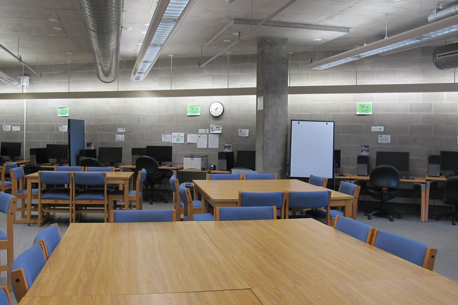 Learning Center Computer Lab with tables, chairs, and computers.