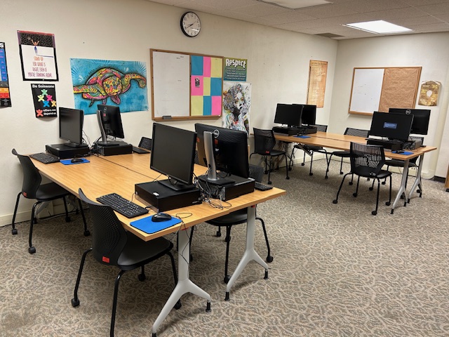 Front view of the room with student computer desks