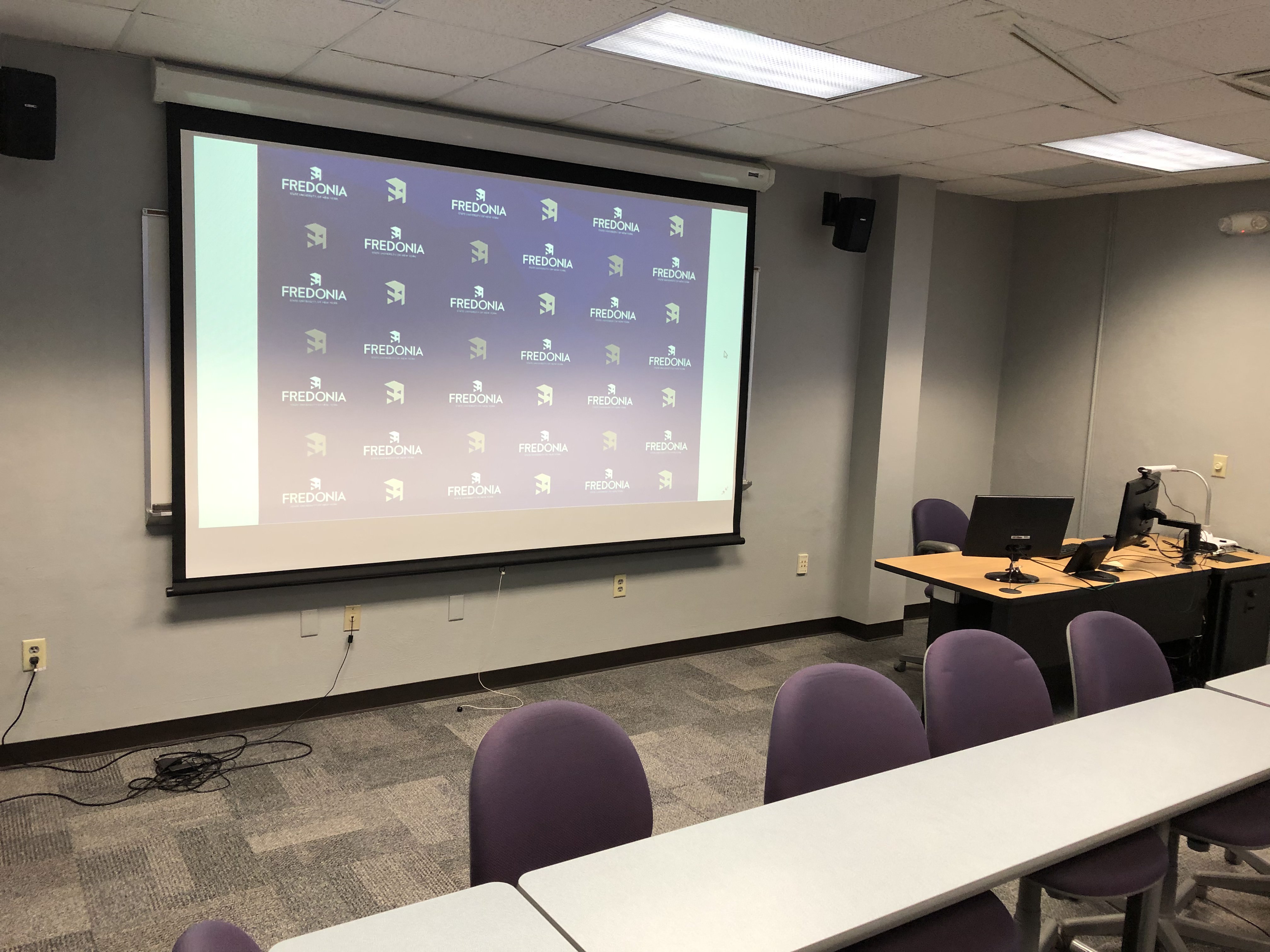 Projector Screen and Teachers Station