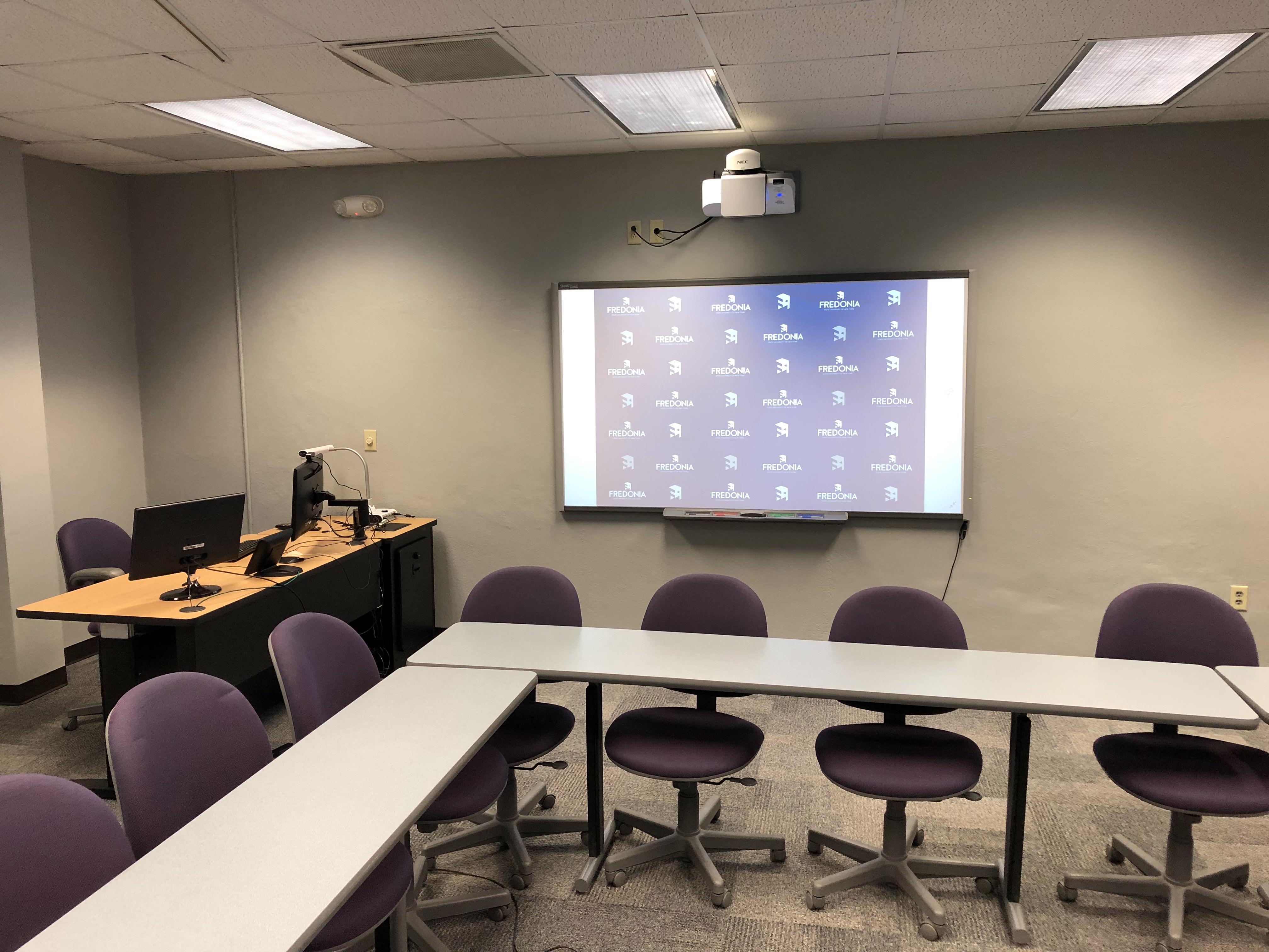 Projector Screen and Teachers Station