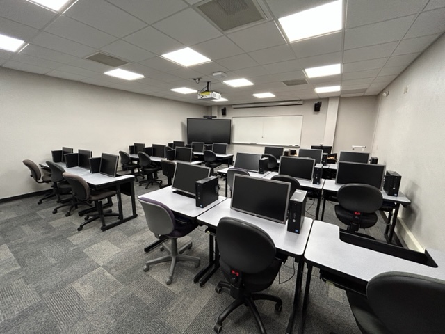 Classroom with student computer desks.