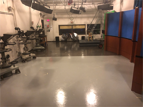 TV Studio with sets, cameras, and equipment.